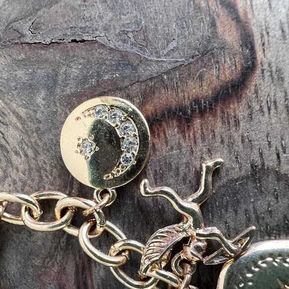 Gold tone charm adjustable charm bracelet- feather, lock, heart, star, moon - Picture 2 of 9